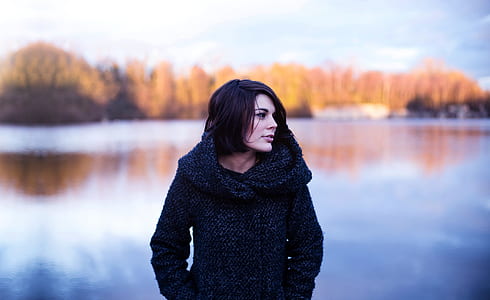 woman wearing black hoodie selected focus photography thumbnail