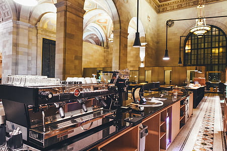 espresso machine on table beside hallway thumbnail
