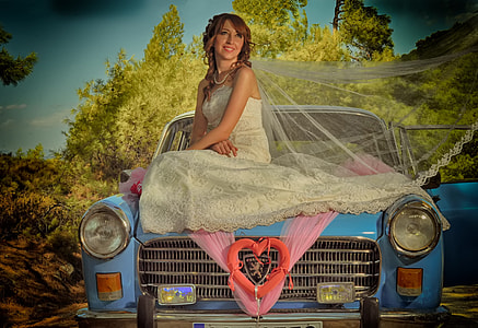 woman sitting on top of car thumbnail