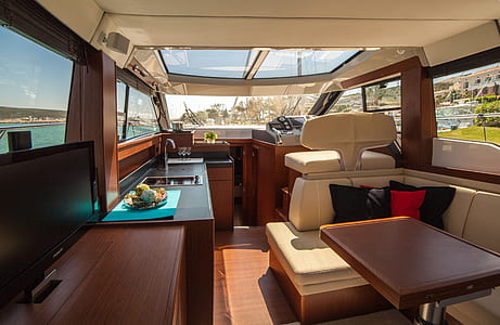 brown and white wooden yacht interior thumbnail