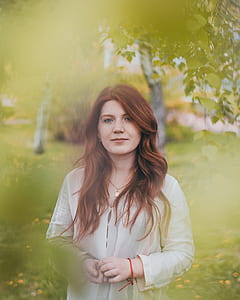 woman in white dress standing thumbnail