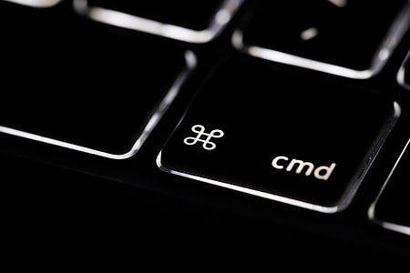 Macro shot of the command key on the backlit keyboard of a laptop computer. Image captured with a Canon 6D thumbnail