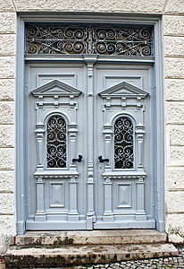closed gray wooden doors thumbnail