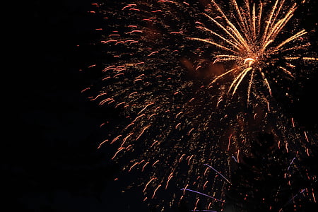 orange fireworks at night time thumbnail