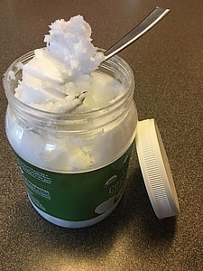 spoon scooped white substance on jar thumbnail