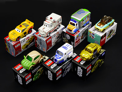 seven assorted-color die-cast toys with boxes thumbnail