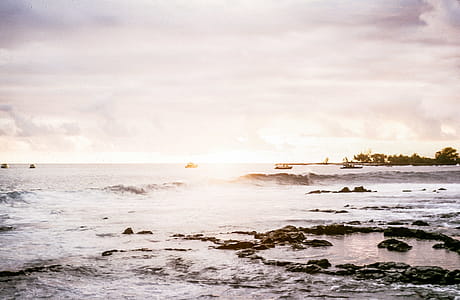 View of an ocean with sunlight on it thumbnail