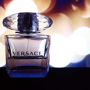 focus photography of Versace fragrance bottle thumbnail