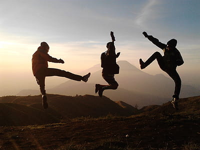 group of three people doing jump shot thumbnail