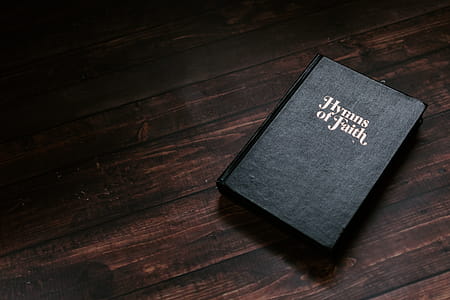 Hymns of Faith Book on Wood Background thumbnail