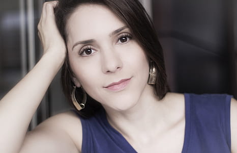 woman near black wall thumbnail