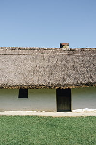 white painted house during daytime thumbnail