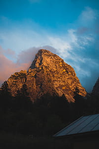 green trees near mountain thumbnail