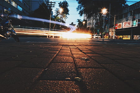 motorcycle on gray pavement during daytime thumbnail