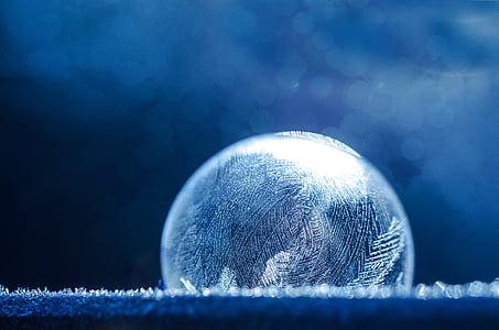 macro photography of white ball thumbnail