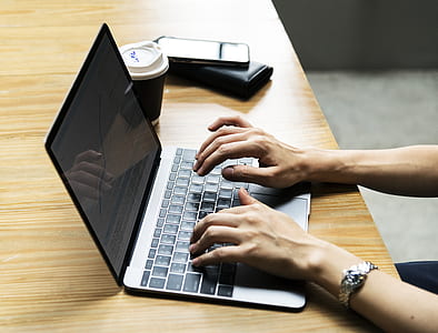 person using laptop thumbnail