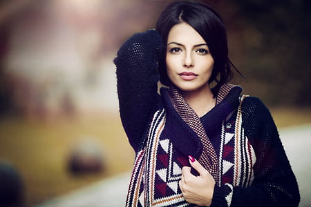 woman wears blue and white knitted long-sleeved shirt thumbnail