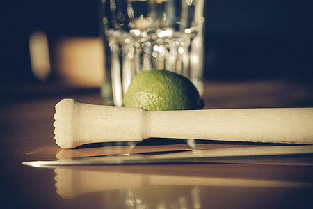 lime behind beige wooden tool thumbnail