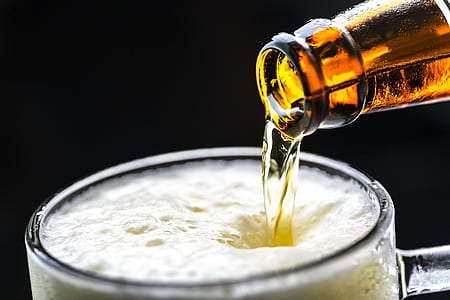beer bottle and clear glass cup thumbnail