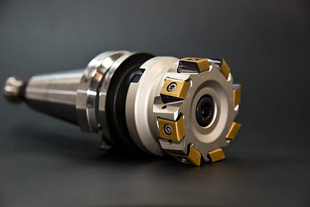 gray metal part with multi-blade thumbnail