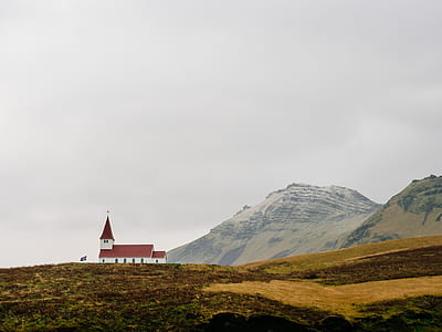 white house near mountain thumbnail