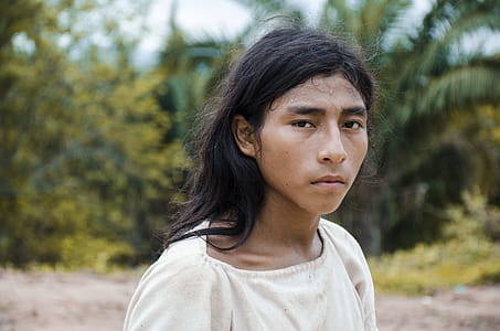 Close-Up Photography of Man With Long Hair thumbnail
