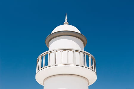 White Lighthouse Under Blue Sky thumbnail