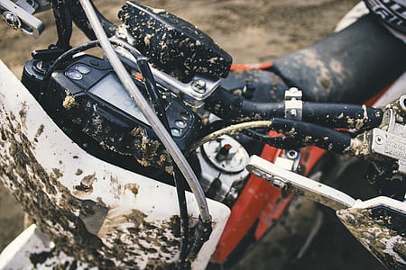 orange and white dirt bike thumbnail