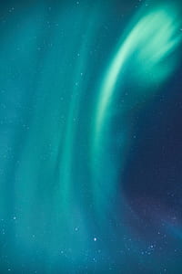 green rays at sky during night thumbnail