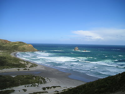 island surrounded by blue ocean water thumbnail