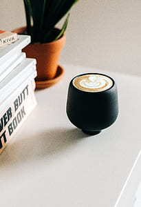 cup of espresso on white wooden table thumbnail