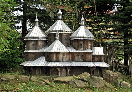 brown and gray temple surrounded by trees during daytime thumbnail