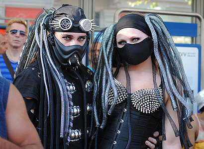 man and woman in costume thumbnail
