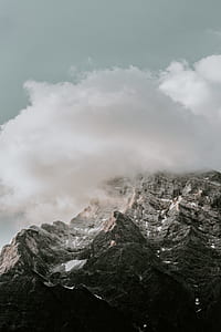 gray mountains covered by clouds thumbnail