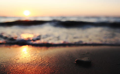 small stone on seashore thumbnail