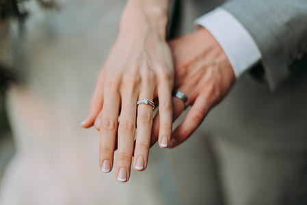 woman hand on of man hand thumbnail