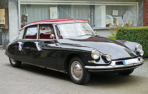 classic black sedan parked outdoor during daytime thumbnail