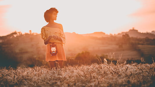 woman standing on wheat field thumbnail