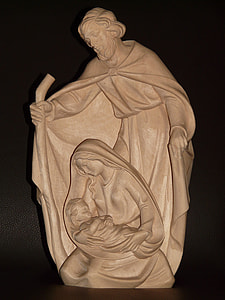 white ceramic nativity of Jesus figurine with black background thumbnail