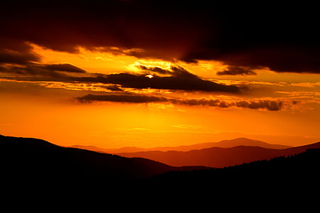 silhouette of mountains during sunset thumbnail