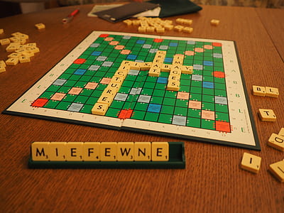 scrabble game set on top of table thumbnail