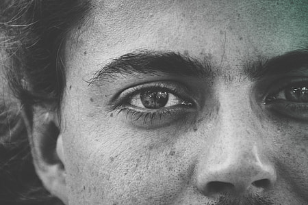 Closeup shot of man’s eye and face thumbnail