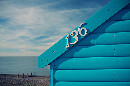 Close-up shot of a blue beach hut on the Kent Coast in the South of England thumbnail