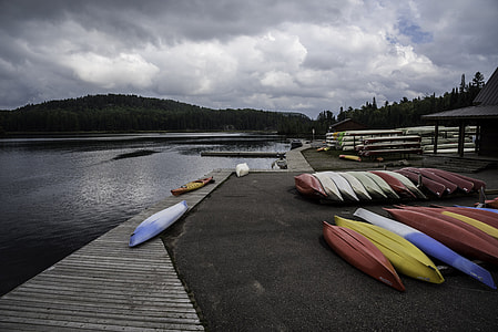 Canoes by the lakeshore at Algonquin Provincial Park, Ontario thumbnail