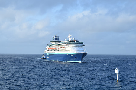 white cruiser ship under white clouds thumbnail
