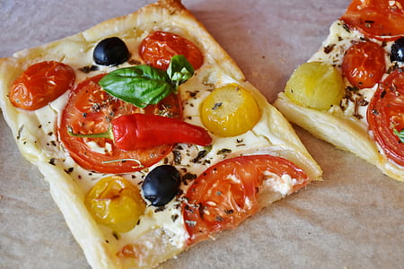 home made pizza on top of white surface thumbnail