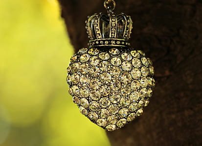 silver-colored clear gemstone encrusted heart pendant thumbnail