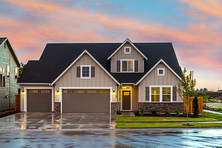 Brown and Gray Painted House in Front of Road thumbnail