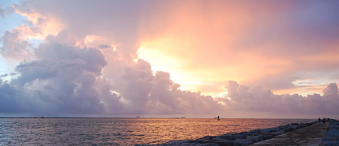 golden hour photography of sea shore thumbnail