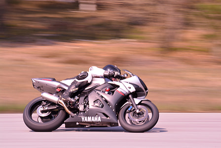 man rides on Yamaha sports bike thumbnail